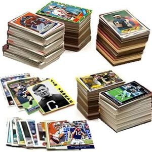 600 Football Cards Including Rookies, Many Stars, & Hall-of-famers. Ships in New White Box Perfect for Gift Giving. Includes an Unopened Pack of Vintage Football Cards That Is At Least 25 Years Old!